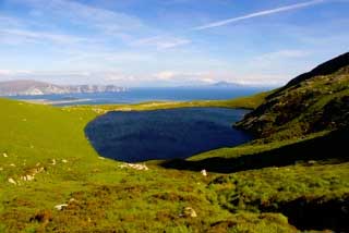 Achill Island showing lake and sea.